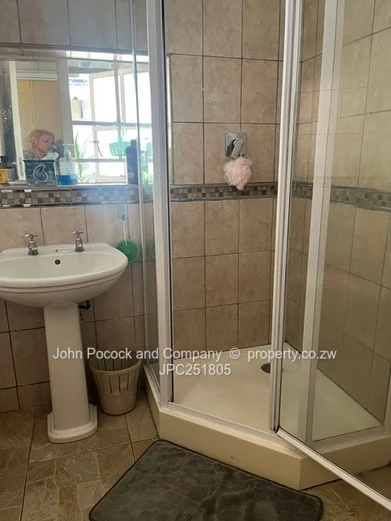 Furnished 4-Bed Burnside Home with Pool & Lush Garden
