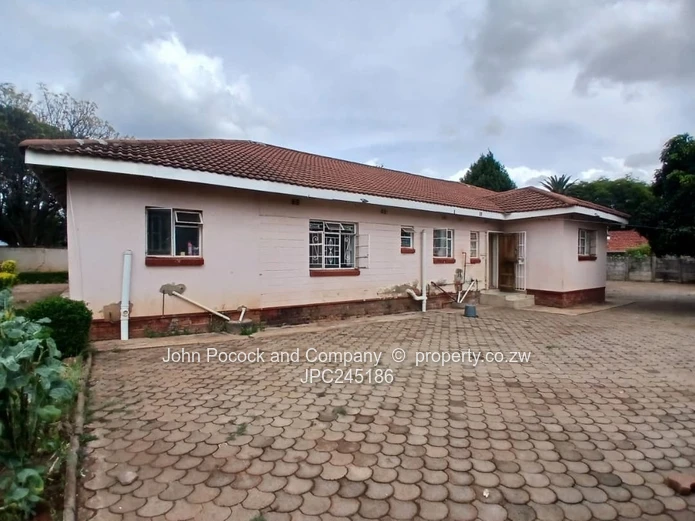 Unlock the Potential of This Well-Located Family Home!